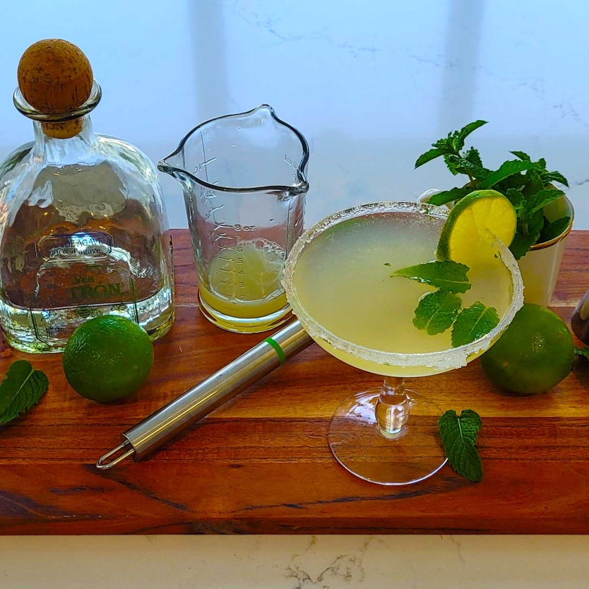 Pouring a Mojarita Cocktail.