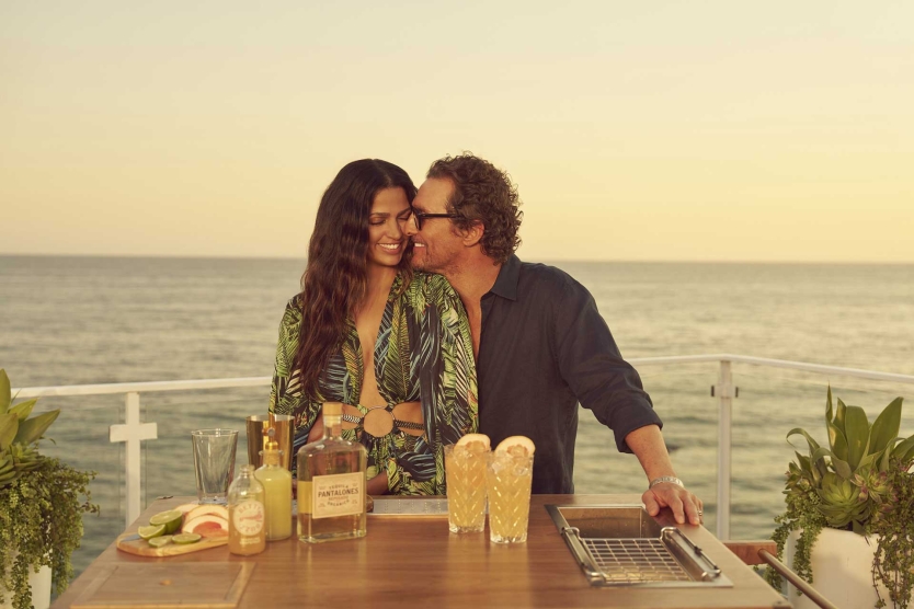 Matthew and Camila McConaughey with Pantalones Premium Tequila abord a cruise ship.